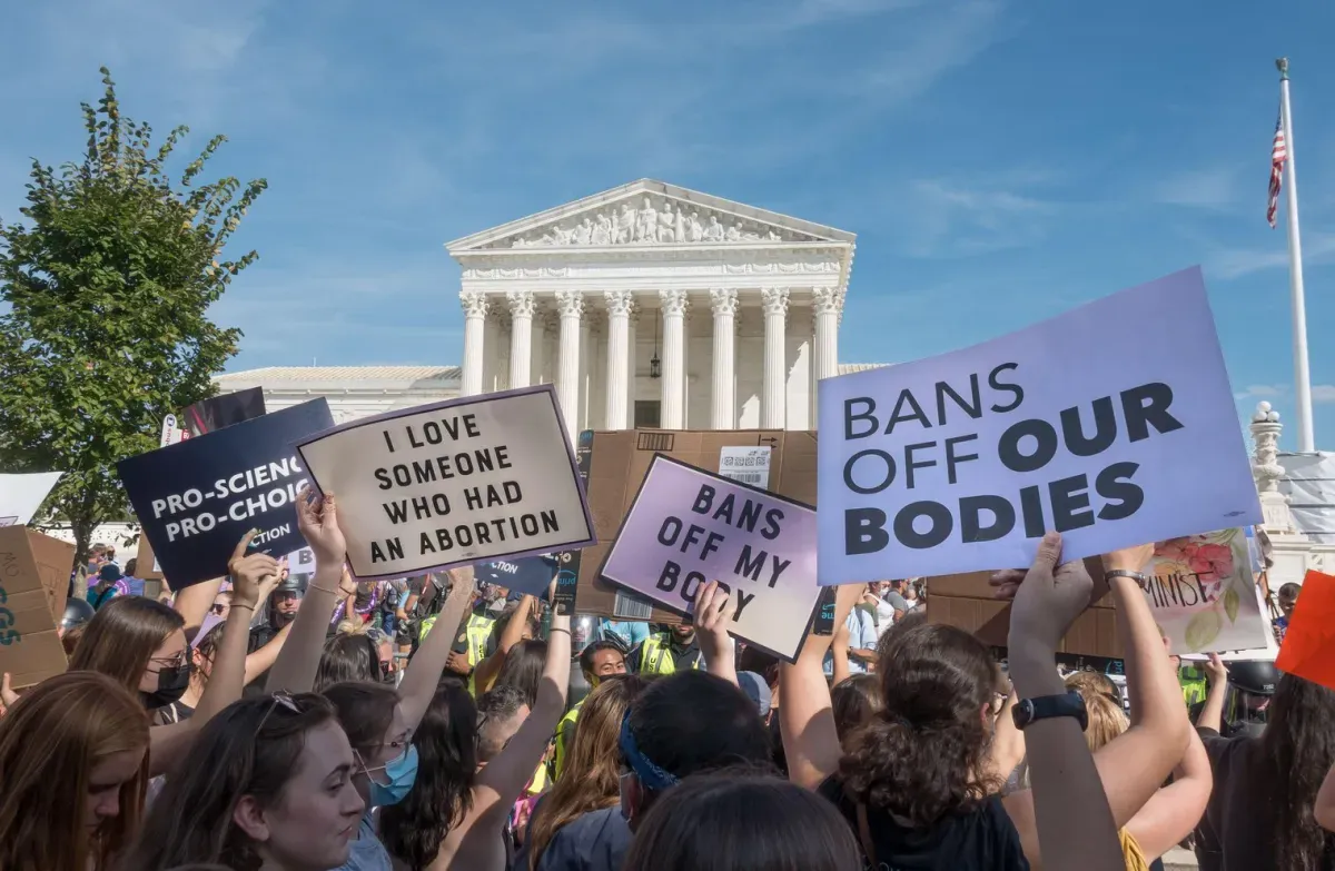 Women protest the Court for the Dobbs decision.